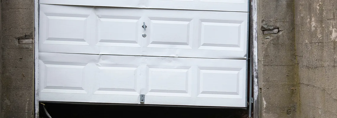 Garage Door Got Hit By A Car Dent Removal in Cape Coral, FL