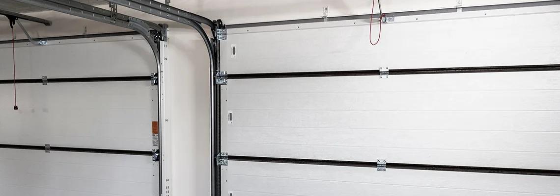 Fix Folding Garage Door Jerking in Cape Coral, Florida